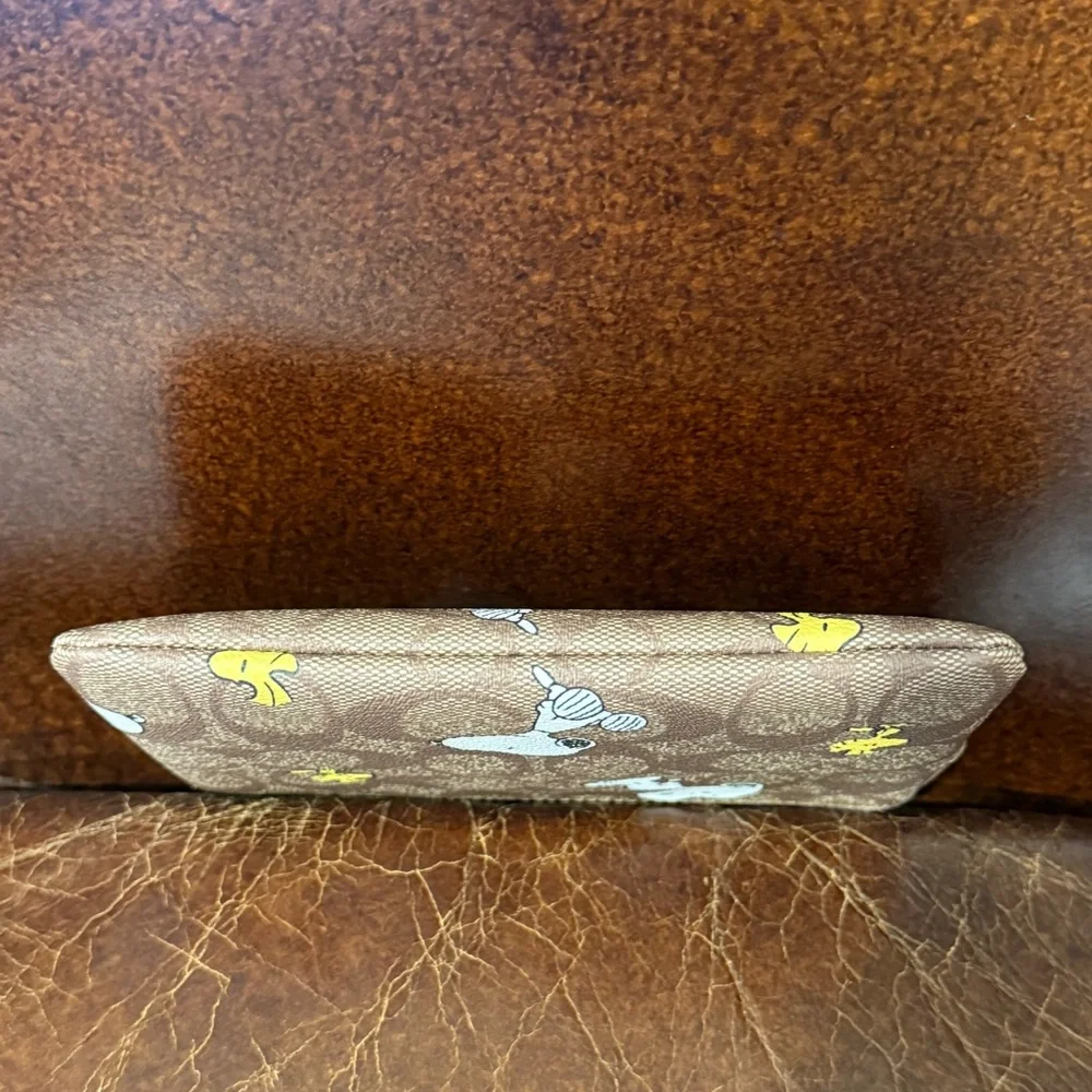 Coach x Peanuts Snoopy and Woodstock Brown Wristlet - Picture 4 of 9